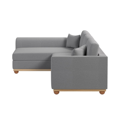 Laylah 3 Seater Fabric Hardwood Sofa with Left Chaise, showcasing its durable polyester linen upholstery and sturdy wood frame, emphasizing modern design and comfort elements.