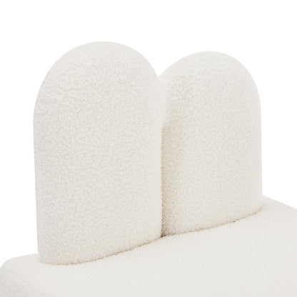 Lenore Boucle Plush Bunny Cushioned Kids Chair featuring a whimsical bunny-shaped backrest and soft boucle fabric, designed for comfort and playfulness in a child's space.