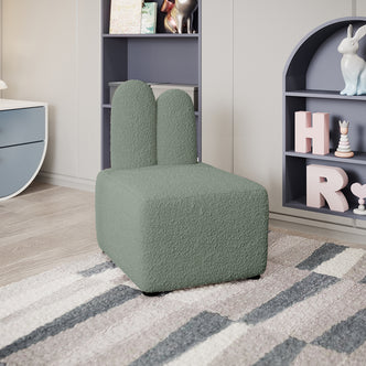 Lenore Boucle Plush Bunny Cushioned Kids Chair with a bunny-shaped backrest and soft boucle fabric, providing a cozy seating option designed for children, enhancing playful charm and comfort in any space.
