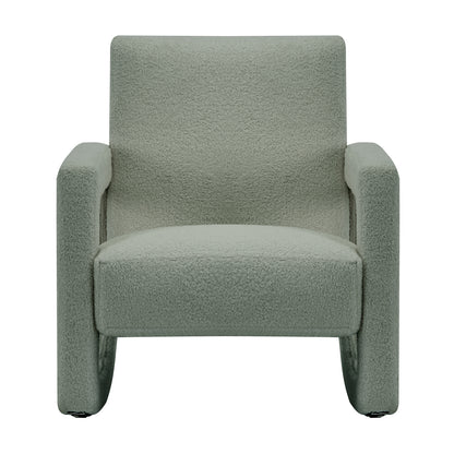Ligeia Boucle Padded Rocking Chair in Mint Green with a boxy, modern silhouette, low back, padded seat, squared armrests, and trapezoid-shaped rocking legs for soothing motion.