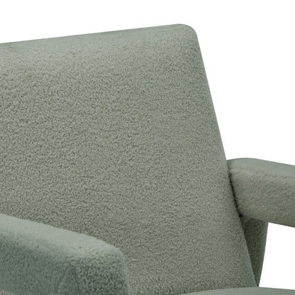 Ligeia Boucle Padded Rocking Chair in Mint Green, showcasing its textured bouclé fabric and cushioned armrest. The close-up highlights its plush design and inviting comfort.