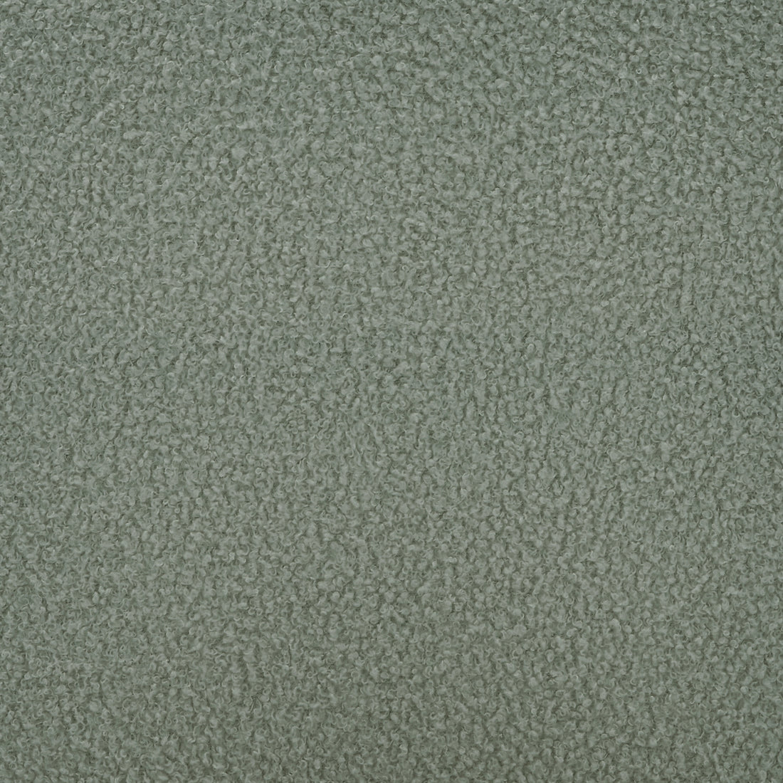 Close-up of Ligeia Boucle Plush Cushioned Rocking Chair in Mint Green, showcasing the textured loop-pile boucle fabric upholstery, highlighting its soft, padded, and cozy appearance, perfect for comfortable relaxation.