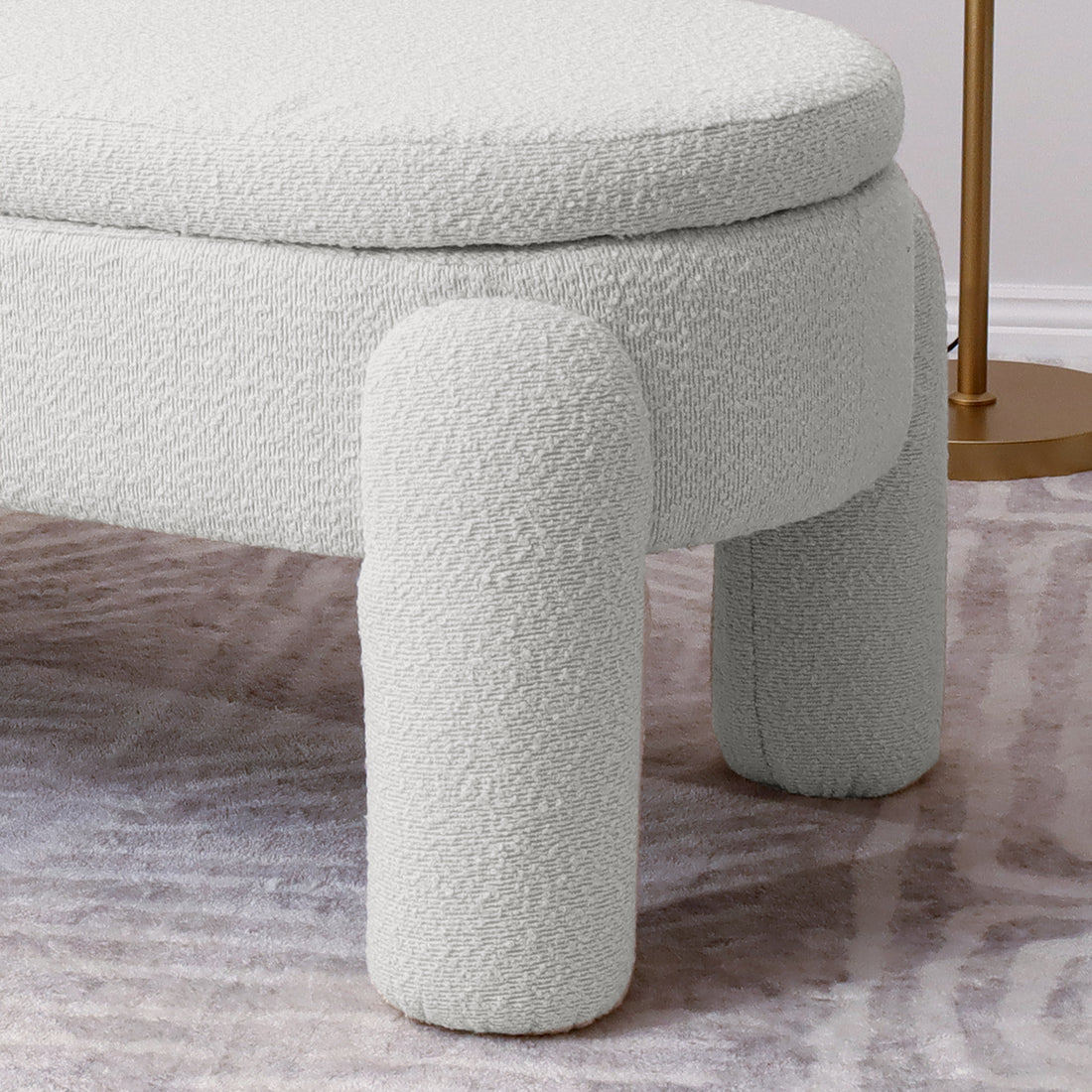 Lonea Bouclé Upholstered Bench w/ Storage Eggshell White, showcasing its luxurious boucle fabric, solid wood frame, and plush foam padding. The bench features a sleek design with smart, hidden storage for tidy organization.