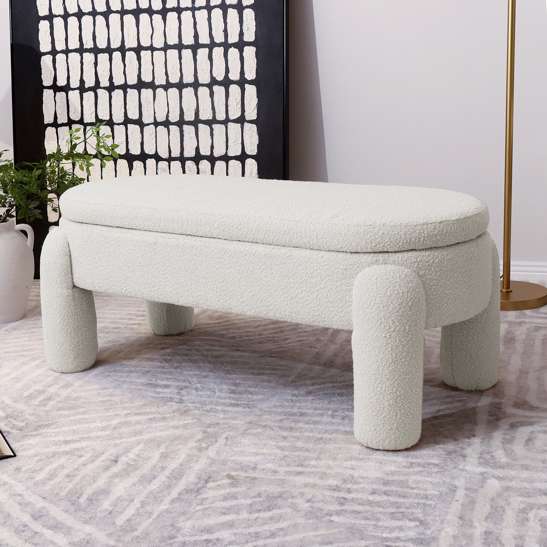 Lonea Bouclé Upholstered Bench with Storage features soft boucle fabric, visible hidden storage compartment, and a sturdy solid wood frame, offering both comfort and functionality for modern interiors.