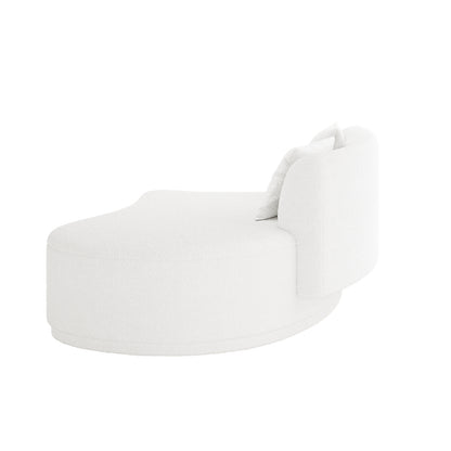 Lyana 4 Seater Boucle Sofa with Right Chaise in Cream White showcases a curved design, upholstered in textured boucle fabric, featuring a small backrest, rounded base, and matching throw pillow.