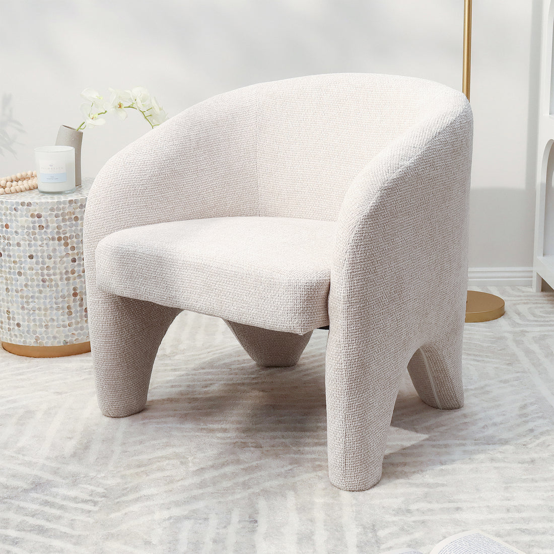 Marlona Linen Chenille Accent Armchair with plush cushioning and a curved silhouette, featuring a sturdy frame and ergonomic design, is shown in a room setting, highlighting its elegant and inviting appeal.