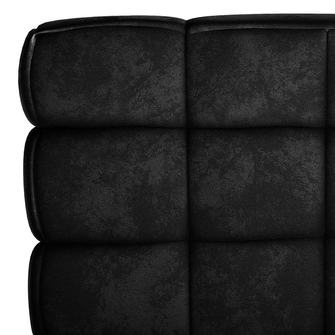 Close-up of Norah 3 Seater Velvet Sofa in Black, highlighting its tufted upholstery with square padded sections and seams, showcasing the luxurious and modern design ideal for contemporary living spaces.
