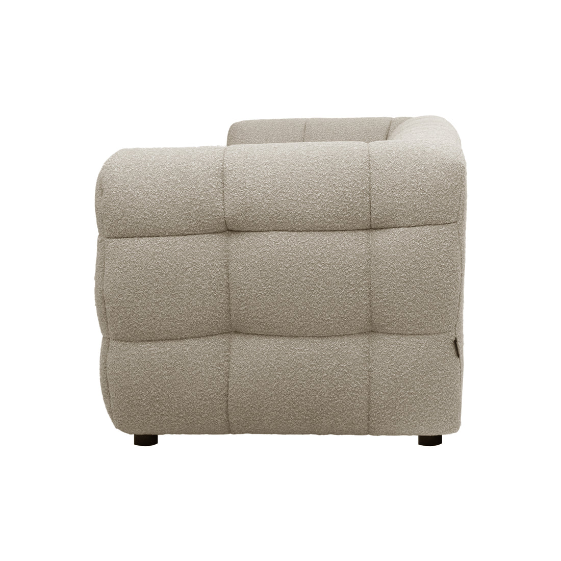 Norah 3 Seater Boucle Sofa in Warm Beige features a modular corner design with tufted squares, upholstered in textured boucle fabric, offering a plush, contemporary look with padded, quilted blocks.