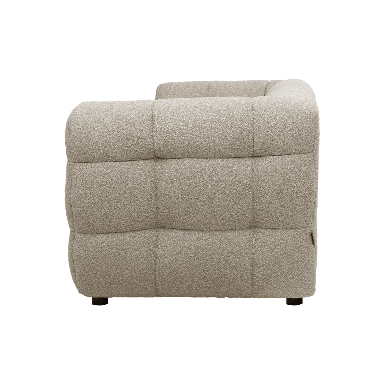 Norah 3 Seater Boucle Sofa in Warm Beige features a modular corner design with tufted squares, upholstered in textured boucle fabric, offering a plush, contemporary look with padded, quilted blocks.