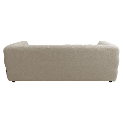 Rear view of Norah 3 Seater Boucle Sofa in Warm Beige, showcasing its modern design with light beige bouclé fabric, suitable for contemporary living spaces.