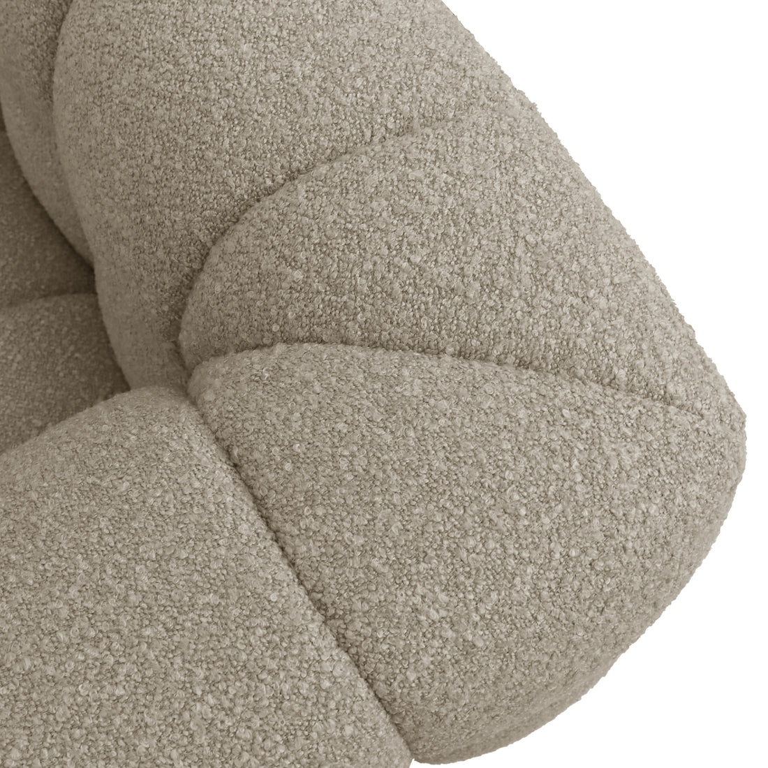 Norah 3 Seater Boucle Sofa in Warm Beige, showcasing close-up of cream-beige boucle fabric with visible tufted, padded segments. The textured looped upholstery highlights the sofa's contemporary, inviting aesthetic.