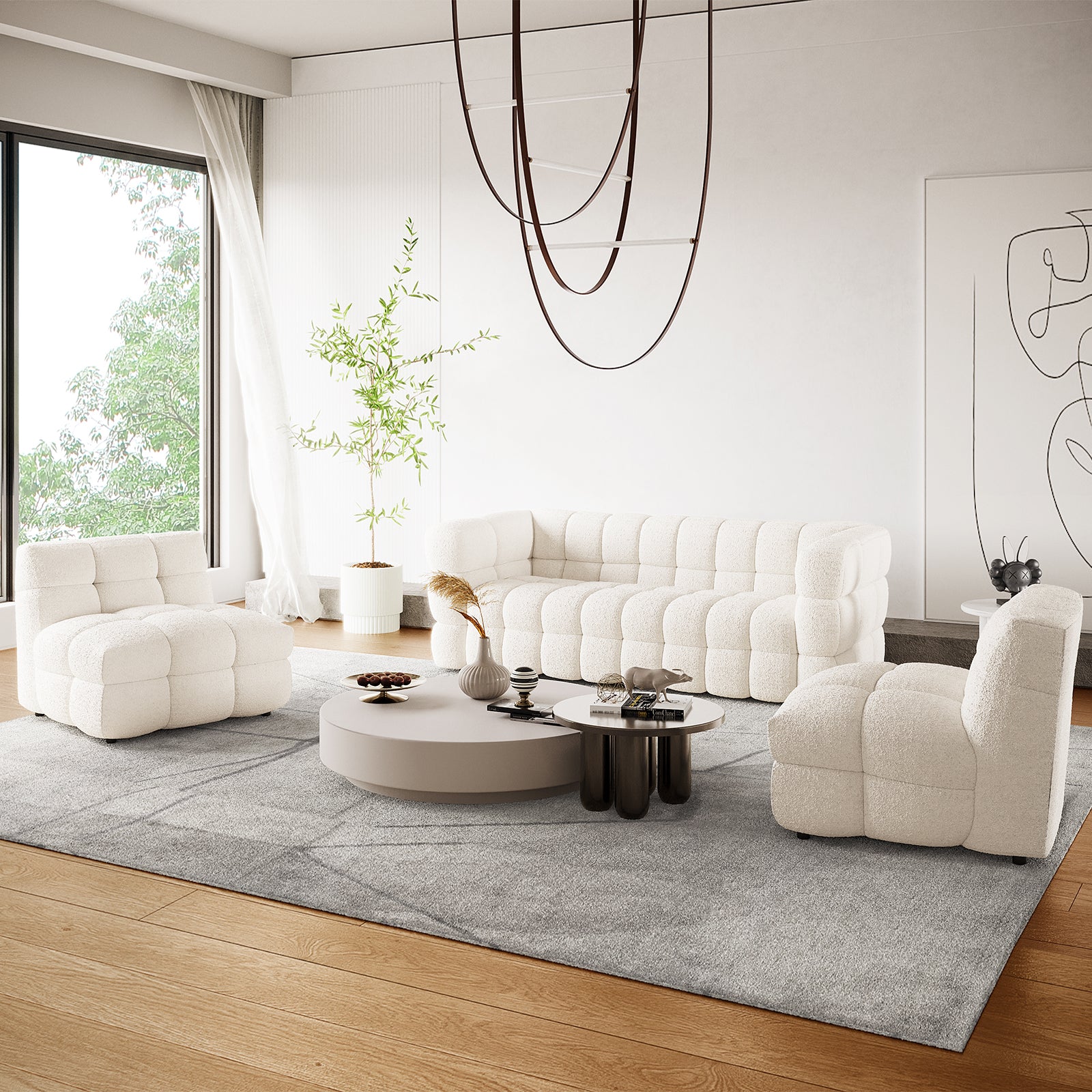 Norah 5 Seater Boucle Fabric Sofa Set in Cream White, featuring a tufted three-seat sofa and two armless chairs, styled with round coffee tables and a light-gray area rug in a bright living room.