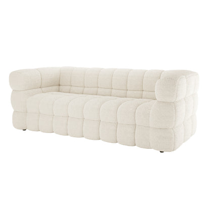 Norah 5 Seater Boucle Fabric Sofa Set in Cream White features a plush, tufted design with a low, squared silhouette, offering versatile, modern comfort with armless modular pieces.