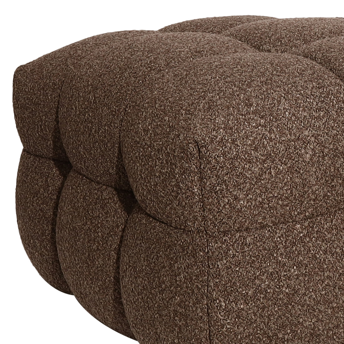 Close-up of the Norah 5 Seater Boucle Sofa Set With Ottoman in Brown, highlighting the tufted, quilted texture of the ottoman's cushion, showcasing the distinctive rounded stitched bubbles for plush comfort.