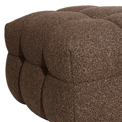 Close-up of the Norah 5 Seater Boucle Sofa Set With Ottoman in Brown, highlighting the tufted, quilted texture of the ottoman's cushion, showcasing the distinctive rounded stitched bubbles for plush comfort.