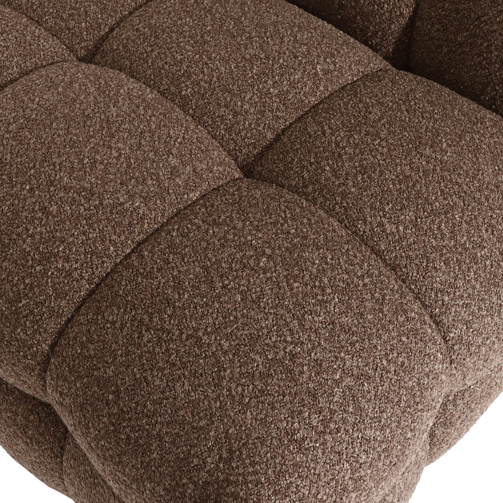 Close-up of the Norah Boucle Single Seater Sofa in Brown, showcasing its tufted, boucle-style upholstery with softly rounded squares, highlighting the plush, padded surface designed for comfort and style.