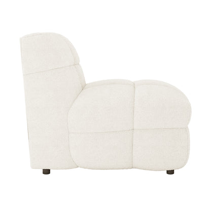 Norah Single Seater Boucle Sofa in Cream White, showcased in profile, features tufted cushions and a modern blocky silhouette, upholstered in soft boucle fabric, highlighting its plush, cloud-like design.