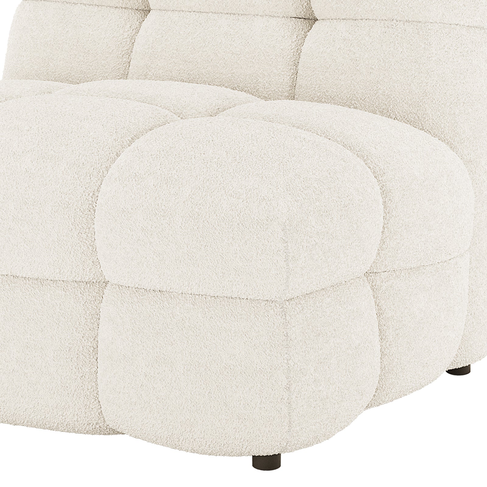 Norah Single Seater Boucle Sofa in Cream White featuring tufted, padded blocks in soft boucle fabric with a visible black leg, epitomizing modern elegance and comfort.