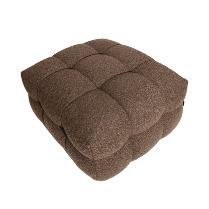 Norah Boucle Ottoman in Brown, a square tufted pouf with a 3×3 quilted pattern, upholstered in textured fabric, serving as a stylish, low footstool or extra seat.
