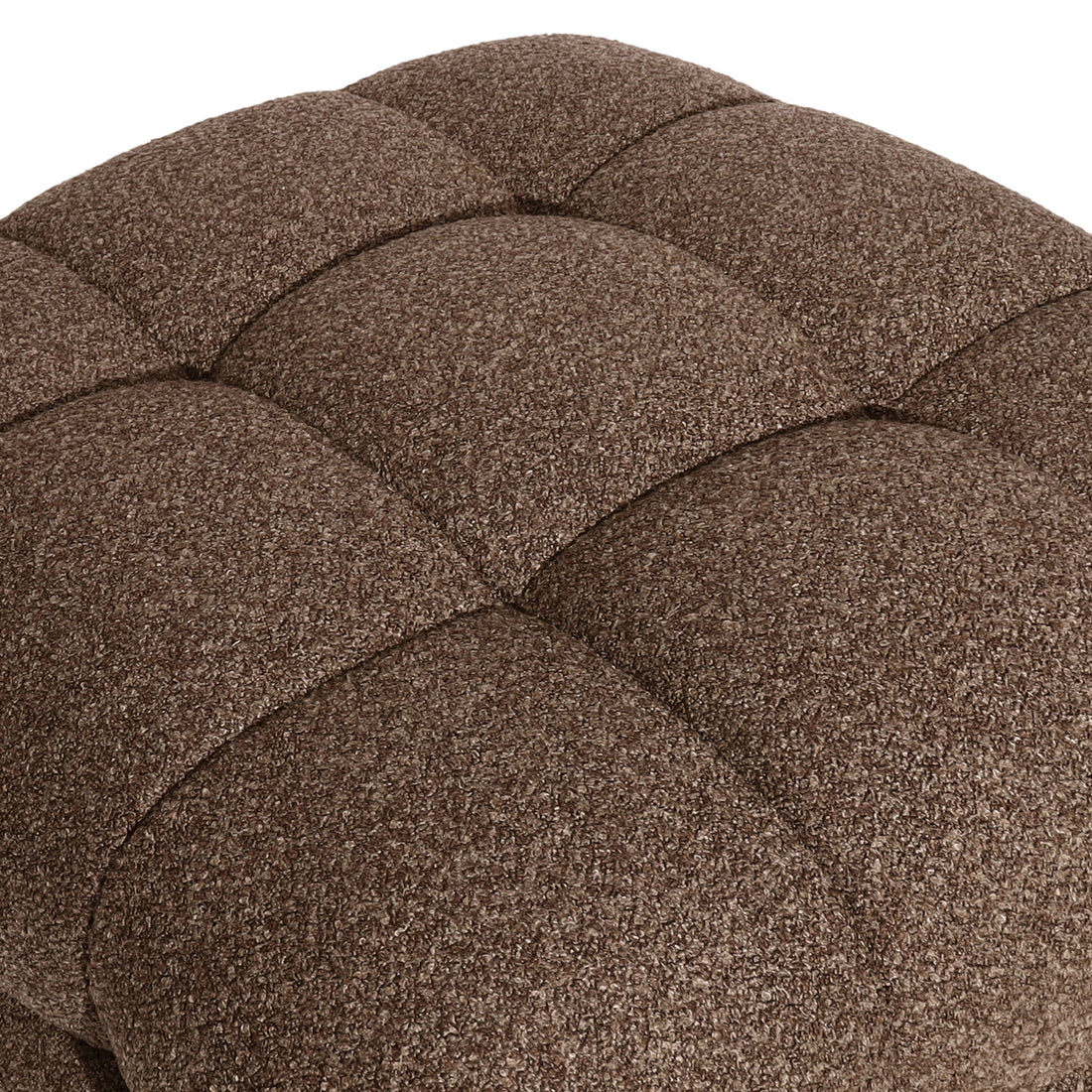 Close-up of the Norah Boucle Ottoman in Brown, showcasing its tufted, cube-style upholstery with a grid of padded squares, highlighting the soft, woven fabric texture.