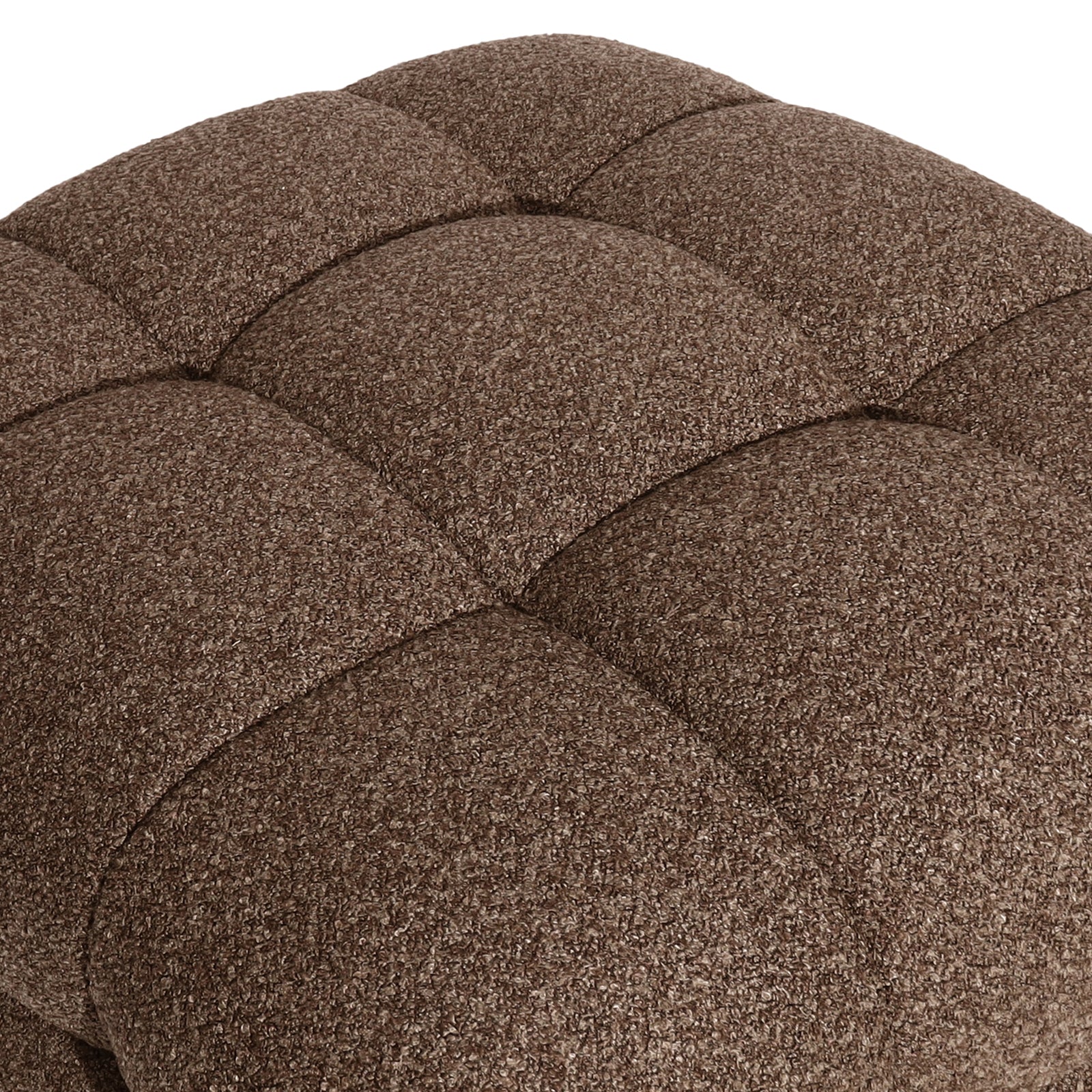 Close-up of the Norah Boucle Ottoman in Brown, showcasing its tufted, cube-style upholstery with a grid of padded squares, highlighting the soft, woven fabric texture.