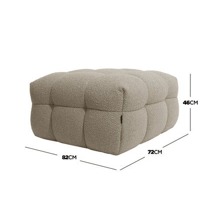 Norah Boucle Ottoman in Warm Beige, featuring a quilted, tufted design with textured bouclé fabric. Its low, square form measures 82x72x46 cm, offering a cushioned look perfect for versatile use.