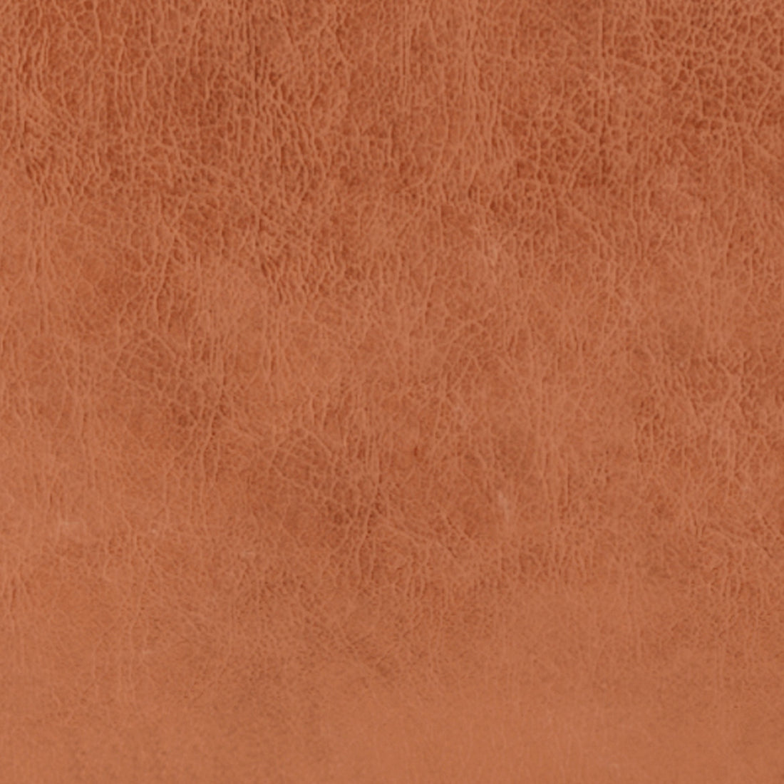 Close-up of the Oslo 3 Seater PU Leather Sofa Mocha, showcasing the smooth PU leather texture and sturdy metal legs, emphasizing its modern style and solid construction.