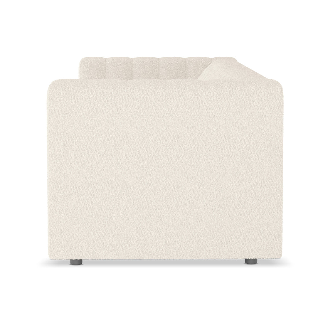 Parisa 3 Seater Tufted Boucle Sofa in Cream White, featuring a modular design with squared-off arms, tufted back cushion, and short, cylindrical feet, upholstered in light-cream boucle fabric.