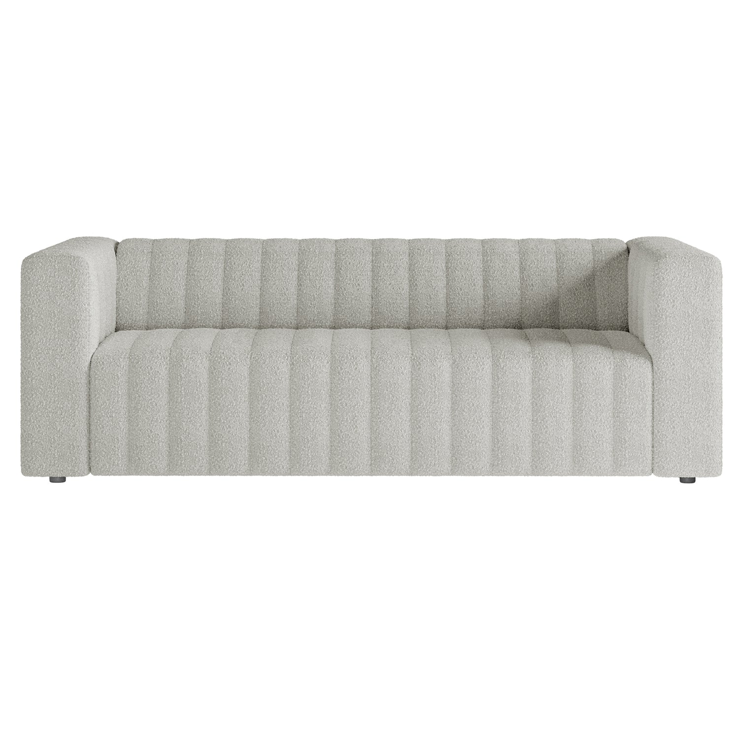 Parisa 3 Seater Tufted Boucle Sofa features a modern design with vertical channel-tufting, broad blocky arms, and a low-rise silhouette, enhancing contemporary interiors with plush comfort.