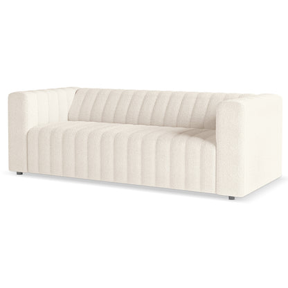 Parisa 4 Seater Tufted Boucle Sofa Set in Cream White, showcasing a modern three-seater design with creamy off-white boucle fabric, vertical channel tufting, and low blocky arms for a contemporary look.