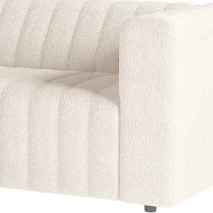 Close-up of the Parisa 4 Seater Tufted Boucle Sofa Set Cream White, showcasing its plush tufted detailing and modern low-rise design with armrests, highlighting its stylish and inviting appearance.