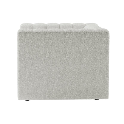 A cube-shaped ottoman in light boucle fabric, part of the Parisa 4 Seater Tufted Boucle Sofa Set in Light Grey, showcasing tufted detailing and plush upholstery.