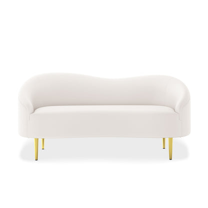 Prima 2 Seater Velvet Sofa in Cream, featuring a wave-shaped back, light fabric, and slim gold-tapered legs, set against a plain white background, showcasing modern elegance and comfort.