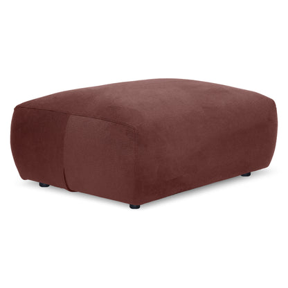 Rust-colored rectangular upholstered ottoman on white background