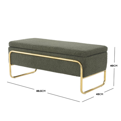 Riane Boucle Storage Ottoman in Green, featuring textured olive-green fabric and a polished gold tubular metal frame with legs. Compact, rectangular design with hidden storage beneath the upholstered seat.