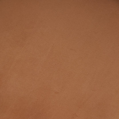 Sadi Velvet Fabric Round Mushroom Ottoman - Burnt Orange, showcasing a soft, slightly mottled brown-orange surface resembling suede. The ottoman's plush texture and modern design add stylish comfort to any living space.