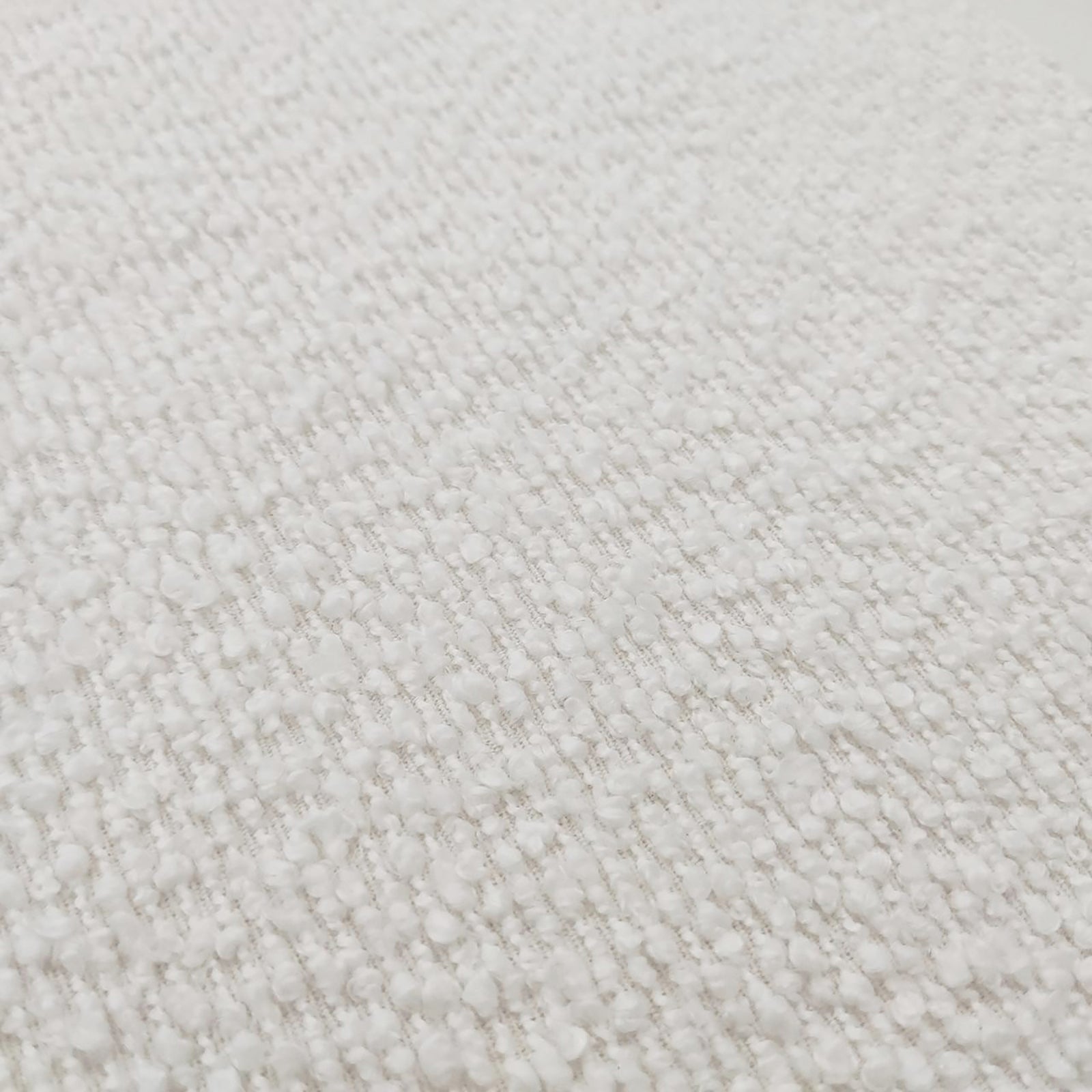 Close-up of the Sadi Bouclé Fabric Round Mushroom Ottoman in Eggshell White, showcasing its textured loop-pile surface and soft, rounded modern design, highlighting the plush and stylish bouclé fabric.