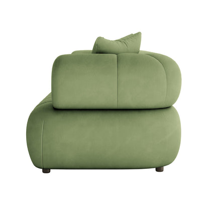 Samira 3 Seater Velvet Sofa in Prasinous Green, side view of upholstered module with plush cushioning and elegant panelled back, showcasing luxurious velvet texture against a white background.