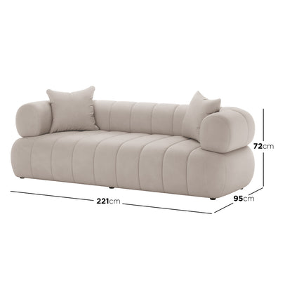 Samira 3 Seater Velvet Sofa - Warm Beige, features plush velvet upholstery with finely detailed stitching, showcasing its elegant design. The sofa's high-density foam cushions and sturdy frame promise both comfort and durability.