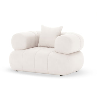 Samira Single Seater Velvet Sofa in Cream, featuring an over-stuffed design with tubular armrests and a matching back cushion, creating a luxurious, low-profile accent chair for any room.