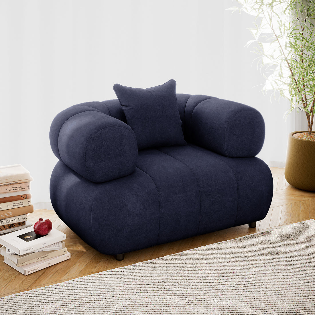 Samira Single Seater Velvet Sofa - Navy Blue, featuring plush velvet upholstery, a single pillow for added comfort, and a sleek, modern design, positioned in a cozy, stylish living space.