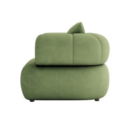 Samira Single Seater Velvet Sofa in Prasinous Green, featuring a low-slung, rounded profile with plush olive-green upholstery, pillowy sections, and a matching cushion on small, hidden feet.