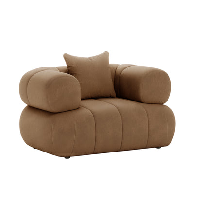 Samira 6 Seater Velvet Sofa Set - Camel Brown, featuring plush cushioning, a matching pillow, and elegant design elements, providing luxurious seating with visible velvet texture and a sturdy frame.
