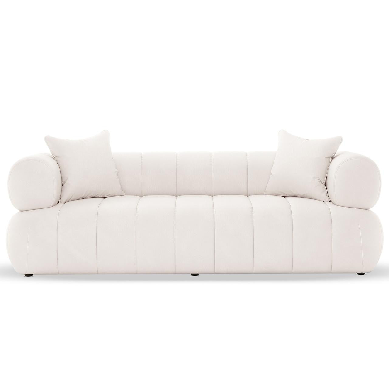 Samira 6 Seater Velvet Sofa Set in Cream features a modern, low-profile design with channel-stitched base and back, cylindrical bolster cushions at armrests, and two matching throw pillows on each end.