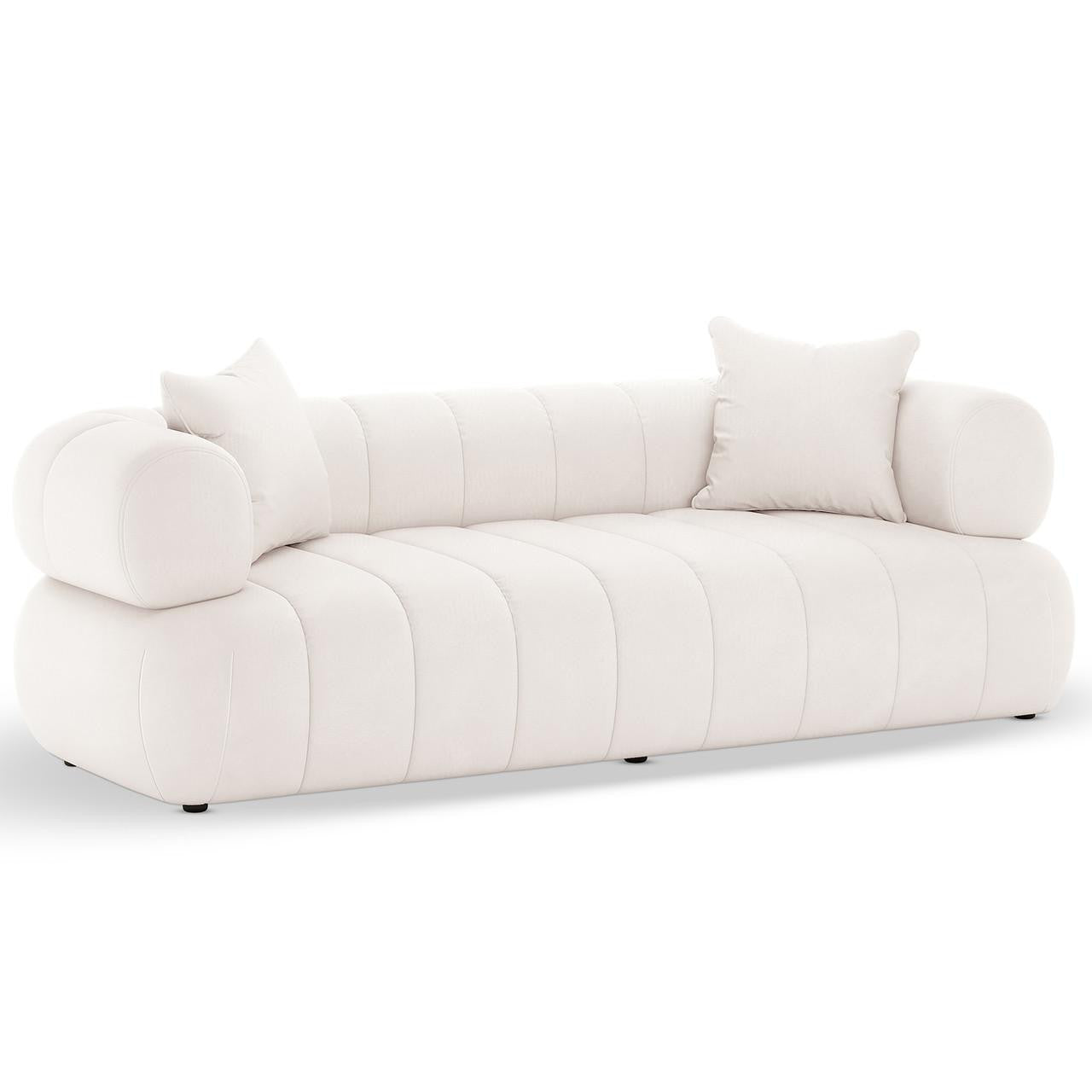 Samira 6 Seater Velvet Sofa Set in Cream features a modern design with rounded arms, vertical channel-stitching, and two matching throw pillows, showcasing an inviting and elegant upholstered style.