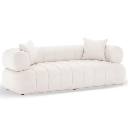 Samira 6 Seater Velvet Sofa Set in Cream features a modern design with rounded arms, vertical channel-stitching, and two matching throw pillows, showcasing an inviting and elegant upholstered style.