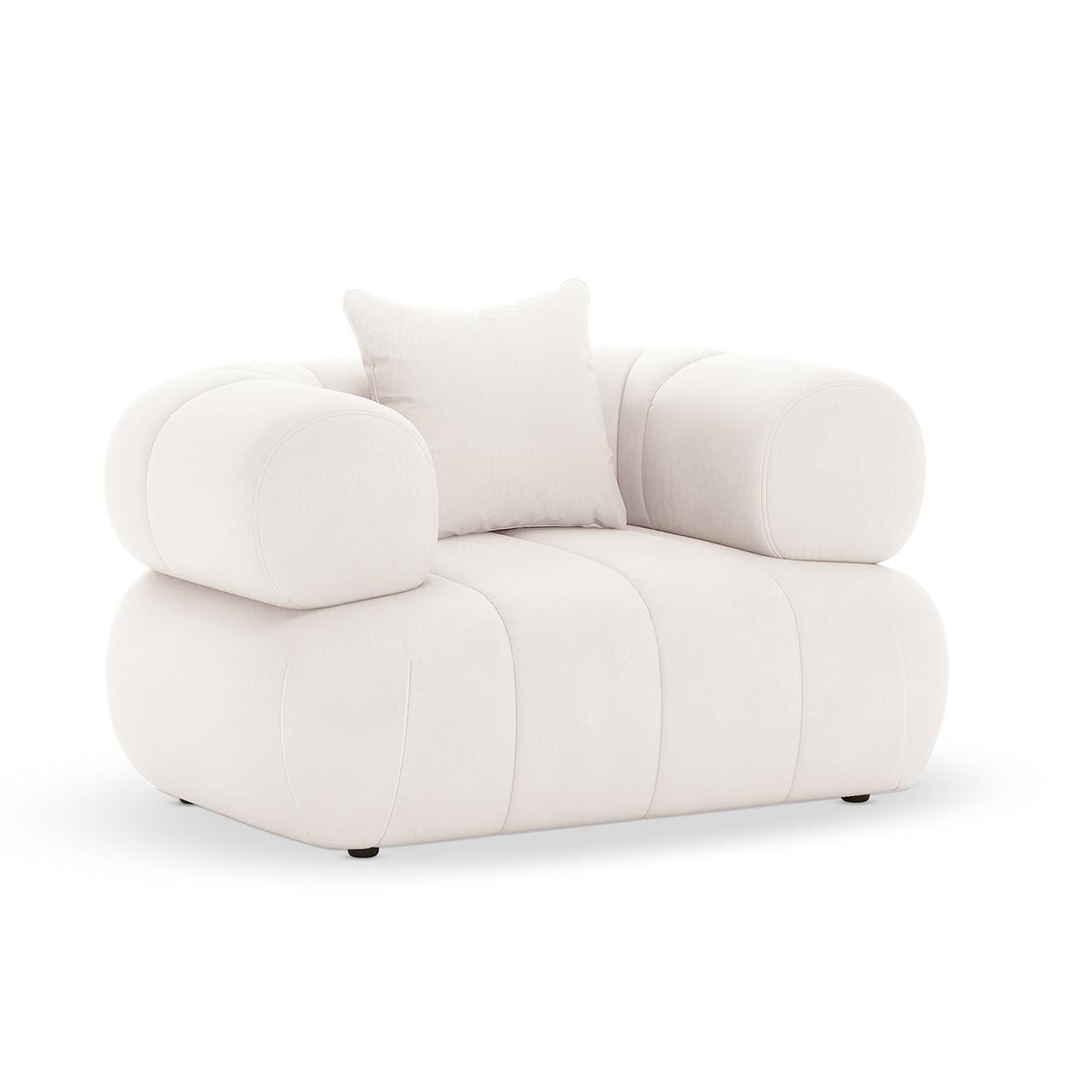 Samira 6 Seater Velvet Sofa Set in Cream: Features a plush, modern-style armchair with an off-white fabric, low rounded profile, oversized cylindrical arms, and a matching throw pillow against a plain background.