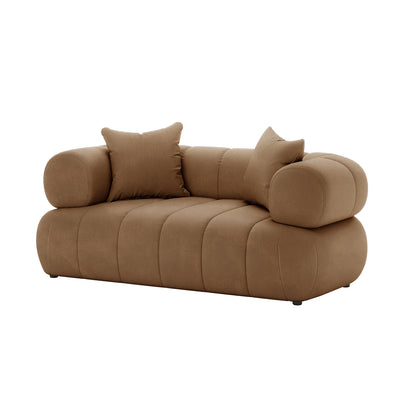 Samira 2 Seater Velvet Sofa in Camel Brown with plush pillows. Features a sleek design, velvet upholstery, and sturdy wooden frame, ideal for modern living spaces.