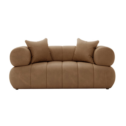 Samira 2 Seater Velvet Sofa in Camel Brown, showcasing plush velvet upholstery, two matching pillows, and sturdy wooden legs, emphasizing comfort and elegance for modern living spaces.