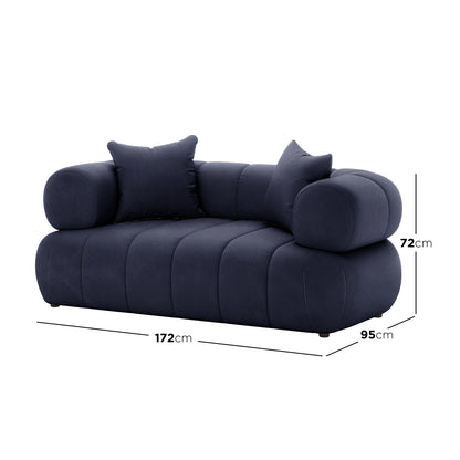 Samira 2 Seater Velvet Sofa in Navy Blue, showcasing its plush velvet texture and sturdy wooden frame, highlighting the sofa's luxurious design and comfortable seating.
